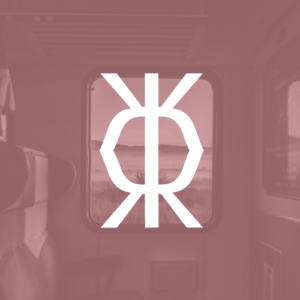 Zdjęcie okna w pociągu i symbol Feminatywy.